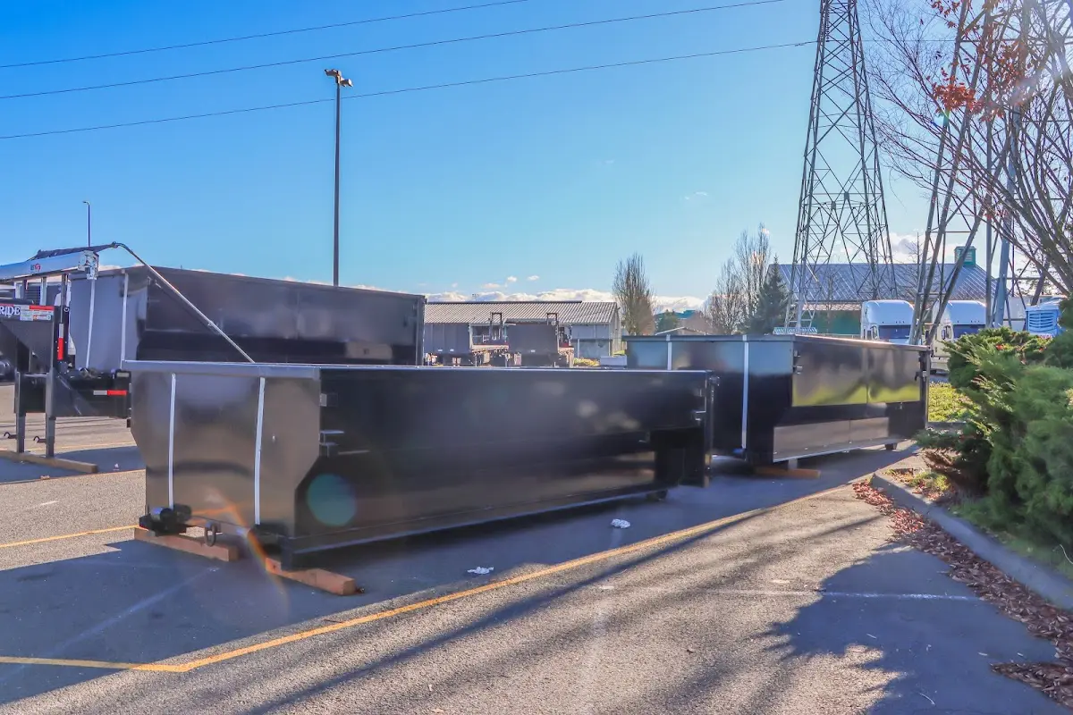 Roll-off dumpster ready for waste disposal at job site for 6 Yard Dumpster Rental in Taylor